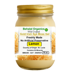 Jar of Lemon Irish Sea Moss Gel by Behalal Organics – Wildcrafted St. Lucia Gold sea moss, organic, vegan superfood supplement with citrus flavor in glass container, photographed with fresh lemons and tropical background